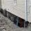 Protecting the Core: A Technical Analysis of Residential Foundation Maintenance and Drainage